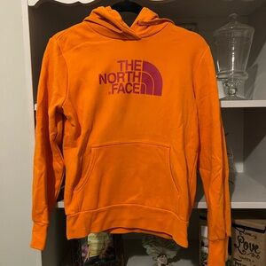 The North Face Vibrant Orange Hoodie with Pink Logo